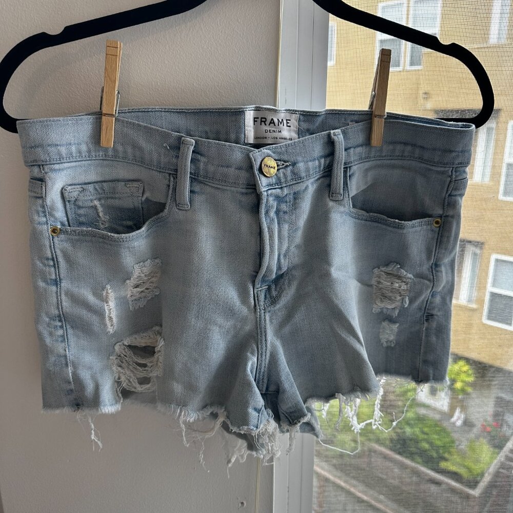 FRAME le Cutoff Demin distressed shorts